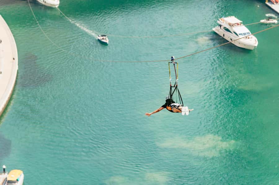 Dubai: Marina Ziplining with Photos, Video and Meal - Flying face down above the yachts