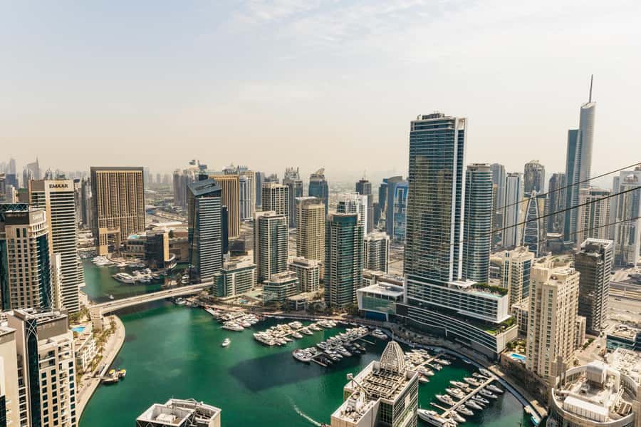 Dubai: Marina Ziplining with Photos, Video and Meal - Riding beside a friend on parallel lines