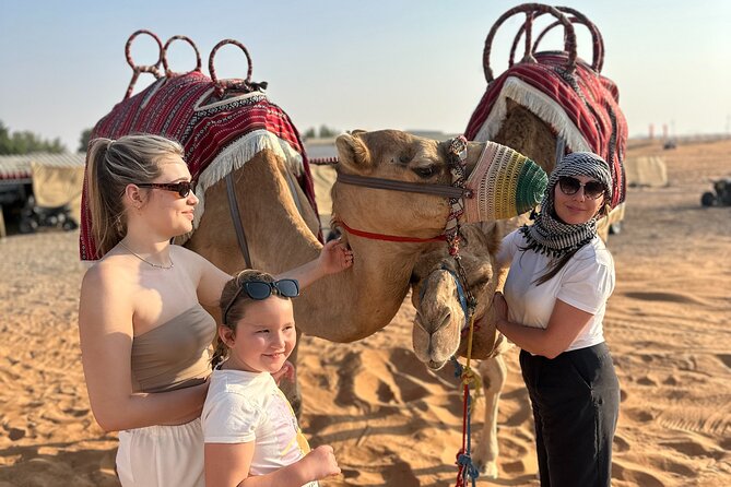 Dubai Morning 4 Seater Buggy Tour Sand Boarding & Camel ride - Sandboarding turns the dunes into a playground
