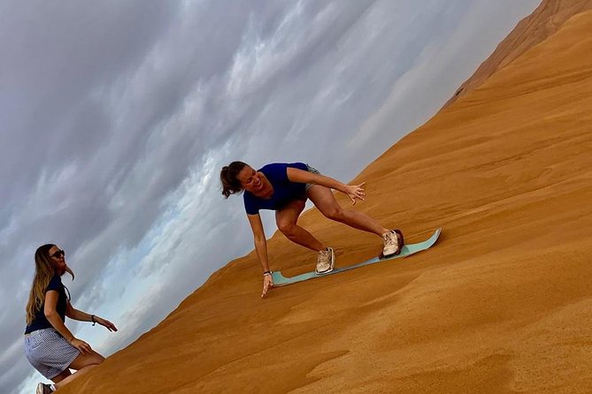 Dubai Morning Desert Safari with Quad Biking & More Activities - Sandboarding on the Red Dunes