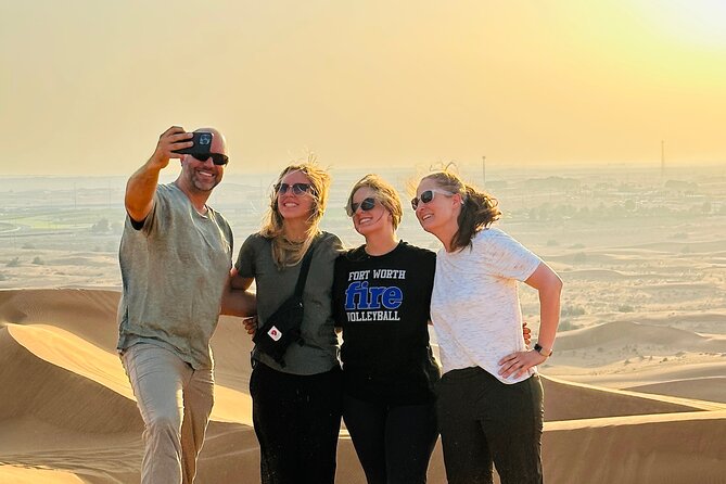 Dubai Morning Evening Desert Safari,Sand boarding and Camel ride - Sandboarding on the Desert Slopes