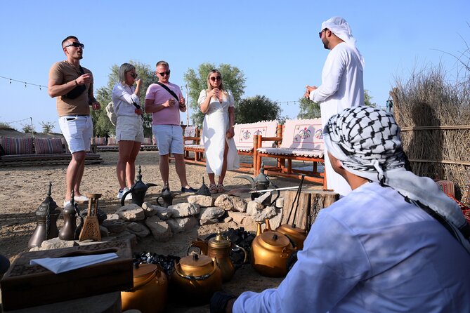Dubai: Morning Heritage Safari by Vintage G Class & Al Marmoom Oasis - A Bedouin village with coffee, clothing, and falcons