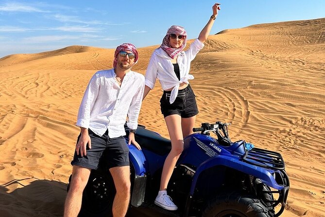Dubai: Morning Quad bike & Safari Adventure , Sandboarding, camel - Water, soft drinks, and useful comfort