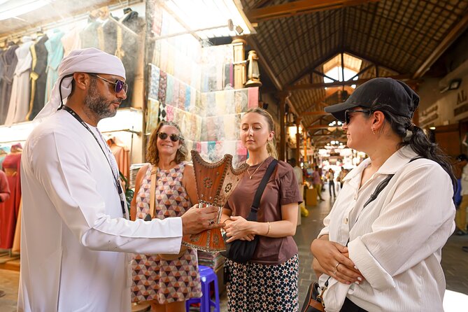 Dubai: Old Town, Souks, Street Food, Guided Tour & Abra Ride - Food included, and what the premium option means