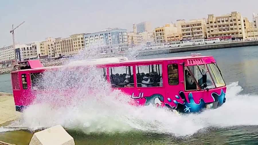 Dubai: Old town tour with Wonder Bus, souks, Creek and Guide - Seeing the souks from a moving seat