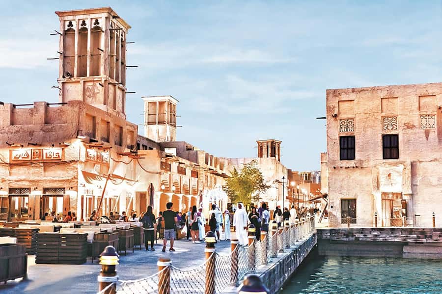 Dubai: Old Town Walking Tour with Abra Cruise & Street Food - Textile Souk: color, bargaining, and practical shopping advice