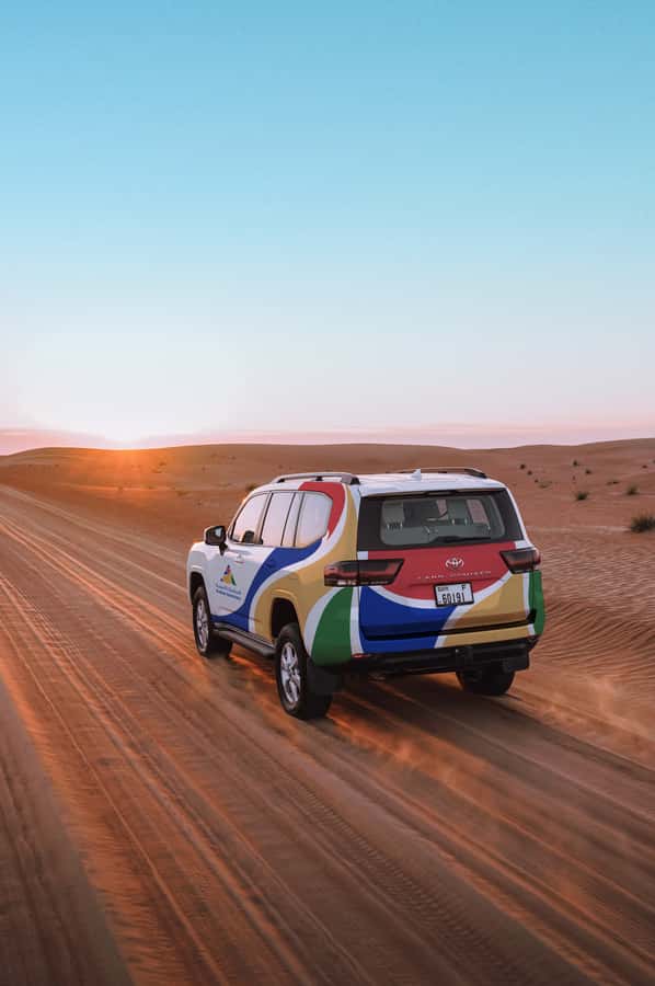 Dubai: Premium Desert Safari, Camel Ride, BBQ & Sandboarding - Red-Dune Dune Bashing at Fort Lisaili