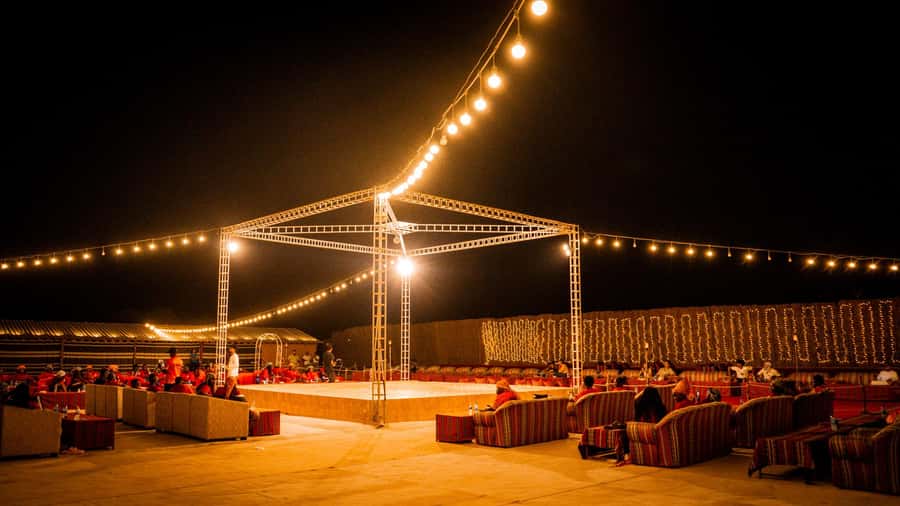 Dubai: Premium Red Dune Safari with Sandboarding & BBQ - Sandboarding and the desert photo stop