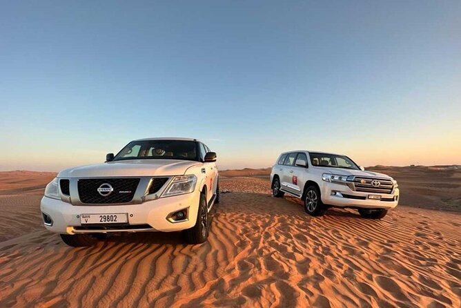 Dubai Private 4x4 Car Desert Safari with Dinner, Camel, and Show - Belly Dancing, Tanoura, And Fire Show