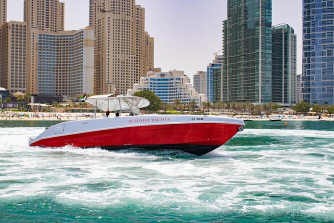 Dubai Private Boat Charter with Optional World Islands Upgrade - Photographing the Burj Al Arab from the sea