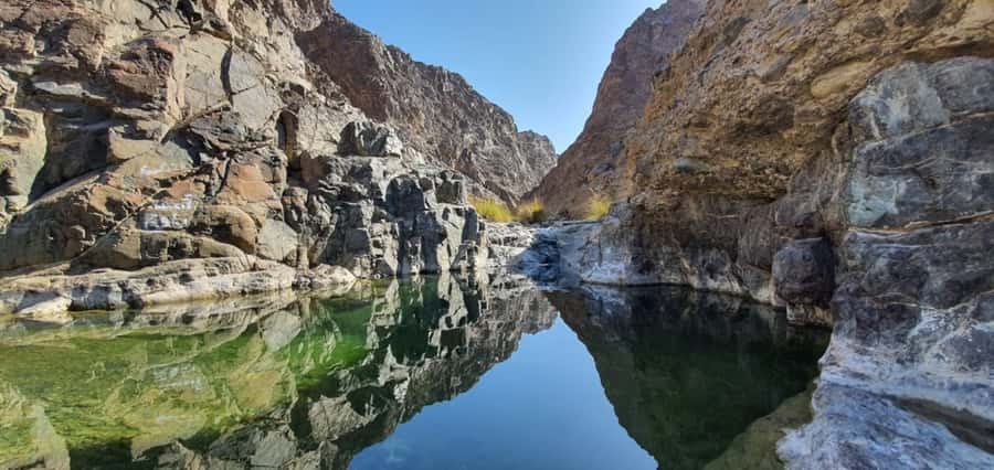 Dubai: Private Desert Day Tour and Wadi Shawka Pool Visit - Camel Rock and Fossil Rock: short stops with a sense of place