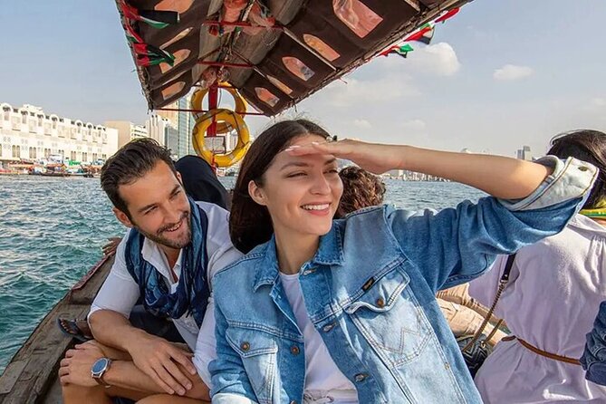 Dubai Private Tour of Creek, Souks, Frame, and Burj Khalifa Entry - Gold, spice, and old souks in Deira