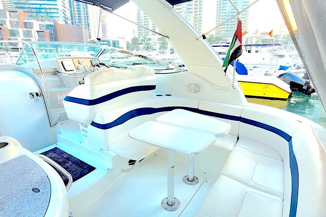 Dubai: Private Yacht Cruise on a 34 Ft Yacht - Swimming, sunbeds, and the onboard setup