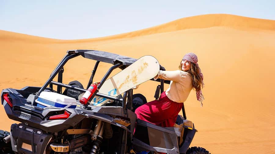 Dubai: Quad Bike, Dune Buggy, and Sandboarding Experience - Sandboarding Down the Red Dunes