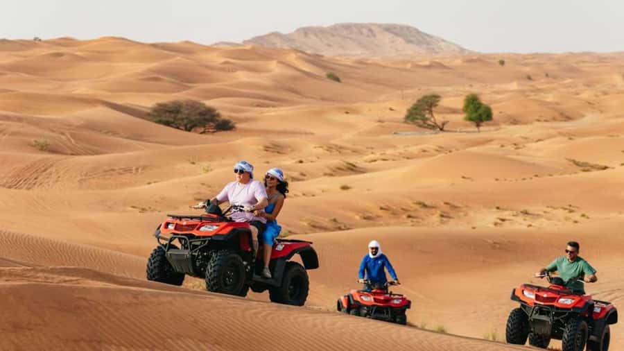 Dubai: Quad Bike, Dune Buggy, and Sandboarding Experience - A Short Camel Ride With a Traditional Feel