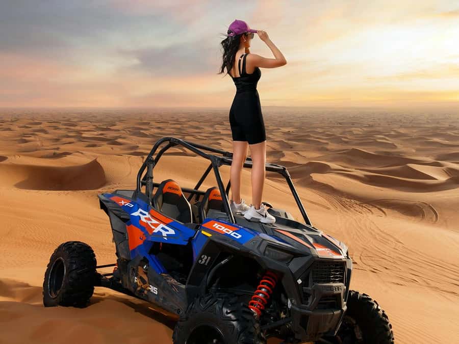 Dubai: Quad Bike or Dune Buggy Adventure & Optional Transfer - Sandboarding and the optional desert camp