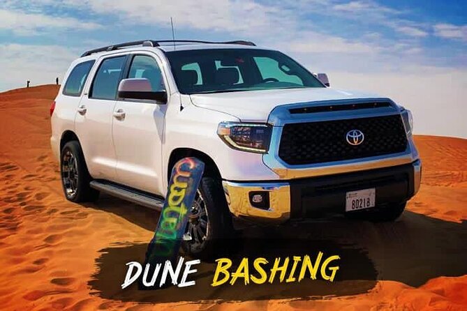 Dubai Quad bike ride 30 Min: Dune bashing, Sand Boarding & Dinner - Sand boarding and a short camel ride