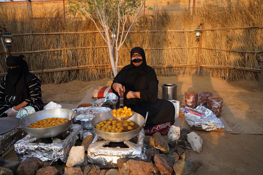 Dubai: Quad Bike Safari, Camels & Al Khayma Camp BBQ Dinner - A short camel ride with a closer look at camp life