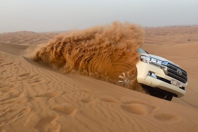 Dubai Red Desert Safari on Private 4x4, Sand Boarding, Camel 4hrs - The ride from Dubai to Al Madam