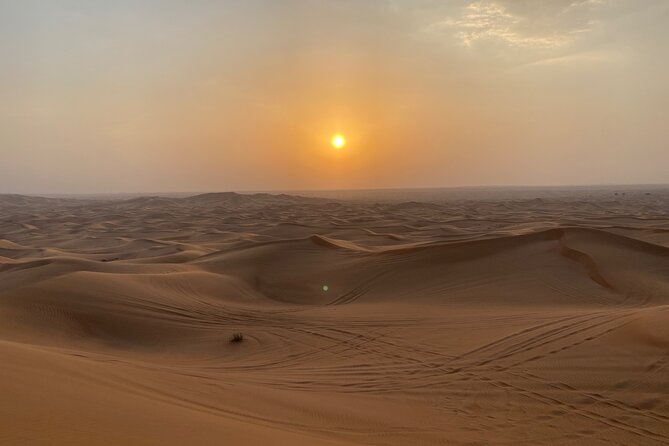 Dubai Red Desert Safari on Private 4x4, Sand Boarding, Camel 4hrs - The value of $214.63 for up to seven people