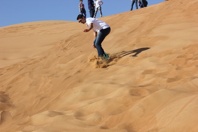Dubai Red Dune Desert Safari, Buggy Ride & BBQ Buffet Dinner - Dune bashing and sand boarding add variety