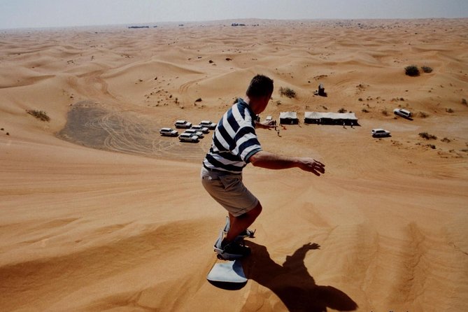 Dubai Red Dune Extreme Desert Safari Adventure With Sand Boarding - Fifteen minutes on a sandboard