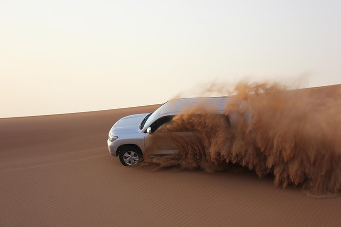 Dubai Red Dune Extreme Desert Safari Adventure With Sand Boarding - The safety side of a high-speed ride