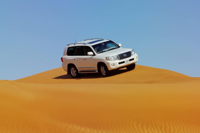 Dubai Red Dune Safari with BBQ Dinner & Live Shows from RAK - BBQ dinner and three evening shows