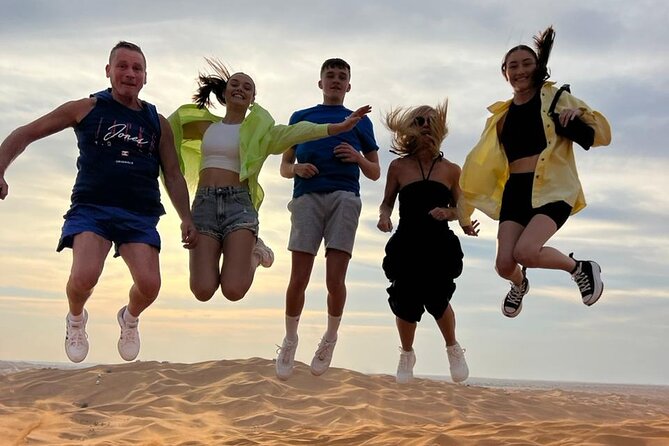 Dubai Red Dune Safari with Bedouin BBQ Dinner & Hotel Transfers - A short camel ride and a close look at falconry