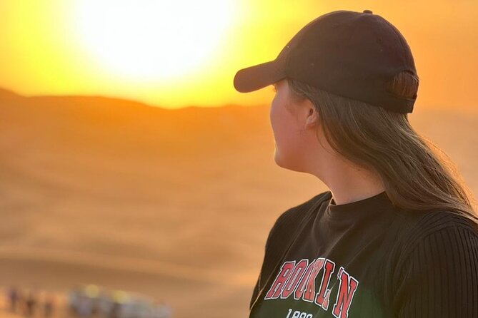Dubai Red Dune Safari with Bedouin BBQ Dinner & Hotel Transfers - Sandboarding and the sunset photo stop