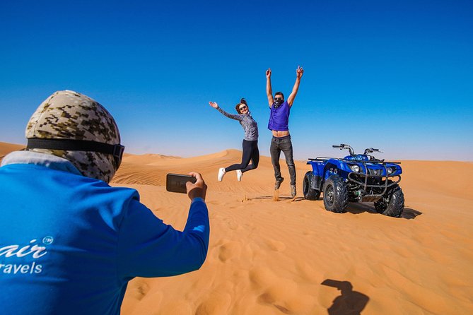 Dubai Red Dunes ATV, Camels, Stargazing & 5<em> BBQ Al Khayma Camp – Key points to know before booking’ /></p>
<ul>
<li><strong>One hour on a self-drive ATV:</strong> Ride across an open red-dune area after a safety briefing, with a helmet and guide included.</li>
<li><strong>Al Khayma camp is the main evening event:</strong> Plan on Arabic hospitality, camel rides, henna, falcon photos, shisha, costumes, dinner, and shows.</li>
<li><strong>The evening slot gives you the full program:</strong> Fire shows and stargazing are included in evening departures, not the 11:30 AM option.</li>
<li><strong>Hotel pickup keeps the day simple:</strong> Air-conditioned transfers are offered from Dubai, Sharjah, and Ajman, though some locations may cost extra.</li>
<li><strong>The ATV carries real responsibility:</strong> You must sign an indemnity form, and damage, lost items, and injuries during the ride are not covered by the operator.</li>
<li><strong>The $88 price covers a lot:</strong> Transport, ATV fuel and helmet, food, drinks, camel activities, sandboarding, performances, and camp access are included.</li>
</ul>
<h2 id="why-this-dubai-desert-tour-works-well">Why this Dubai desert tour works well</h2>
<p> BBQ Al Khayma Camp – Why this Dubai desert tour works well’ /></p>
<p><p>Dubai offers many desert excursions, but this one is built for people who want several classic activities in one booking. You do not need to arrange a separate ATV session, camp dinner, camel ride, and evening show. The day moves from active outdoor fun to a comfortable camp visit, which gives the outing a clear change of mood.</p>
</p>
<p><p>The red dunes around Lahbab provide the visual drama. Their orange color, smooth curves, and steep sandy slopes create better photo opportunities than a simple flat desert drive. You get time for pictures during the ATV outing and again at sunset, so bring a phone or camera that you can protect from sand.</p>
</p>
<p><p>The package is also useful if you have only a few days in Dubai. Six hours is long enough to reach the desert, ride, eat, watch performances, and return without giving up an entire day. Pickup is scheduled around 45 minutes before your selected departure time, so keep your lobby wait in mind when planning other activities.</p>
</p>
<p><p>The tour has a maximum group size of 15 people. That is small enough to feel more manageable than a large coach outing, though you should still expect a planned group schedule rather than a private safari.</p>
</p>
<div class="twil" style="margin: 20px 0; padding: 15px 0;"><p>More red dune safaris in Dubai:</p><ul style="margin: 10px 0; padding-left: 0; list-style: none;"><li style="margin: 0 0 12px 0; padding: 0 0 12px 0; border-bottom: 1px solid #eee; line-height: 1.4;"><a href="https://uaetravelreviews.com/dubai-red-dune-safari-quad-bike-camel-ride-bbq-dinner/">Dubai: Red Dune Safari, Quad Bike, Camel Ride, BBQ Dinner</a><br><span style="font-size: 0.82em; color: #555;"><span style="color: #A87A00;">★</span> 4.9 · 32,185 reviews</span></li><li style="margin: 0 0 12px 0; padding: 0 0 12px 0; border-bottom: 1px solid #eee; line-height: 1.4;"><a href="https://uaetravelreviews.com/dubai-premium-red-dunes-safari-camels-5-bbq-at-al-khayma-camp/">Dubai Premium Red Dunes Safari, Camels & 5* BBQ at Al Khayma camp</a><br><span style="font-size: 0.82em; color: #555;"><span style="color: #A87A00;">★</span> 5.0 · 12,388 reviews</span></li><li style="margin: 0; padding: 0; border-bottom: none; line-height: 1.4;"><a href="https://uaetravelreviews.com/dubai-desert-discovery-red-dunes-safari-sandboard-camel-ride/">Dubai Desert Discovery: Red Dunes Safari, Sandboard & Camel Ride</a><br><span style="font-size: 0.82em; color: #555;"><span style="color: #A87A00;">★</span> 5.0 · 7,653 reviews</span></li></ul></div><h2 id="from-your-dubai-hotel-to-lahbabs-red-dunes">From your Dubai hotel to Lahbab’s red dunes</h2>
<p><img width="669" height="446" decoding="async" src=