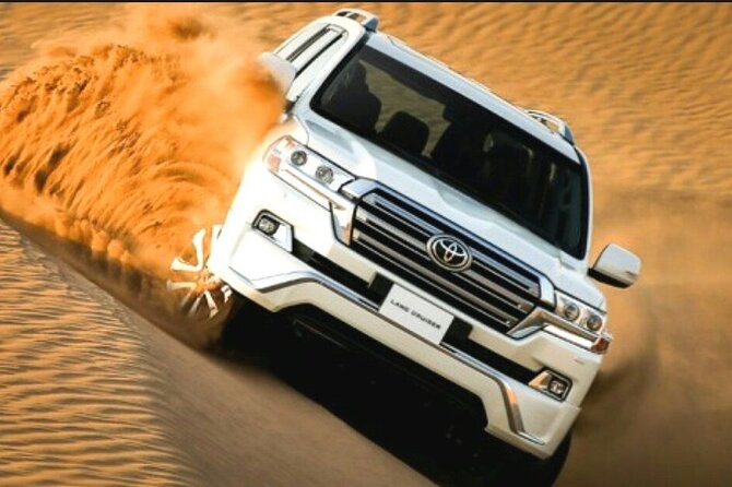 Dubai: Red Dunes Desert Safari, Camel ride, Sandboard, Quad Bike - Sandboarding and Sunset Photos