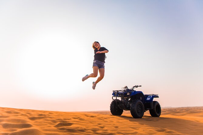 Dubai Red Dunes Desert Safari, Quad Bike, Camels at Al Khayma - Red dunes, fast wheels, and a sunset outside Dubai