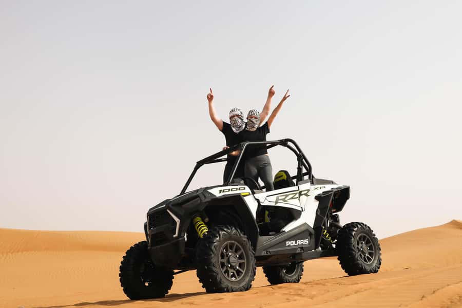 Dubai: Red Dunes Quad Bike, Dune Buggy, Camel & Refreshments - Arriving at the red dunes