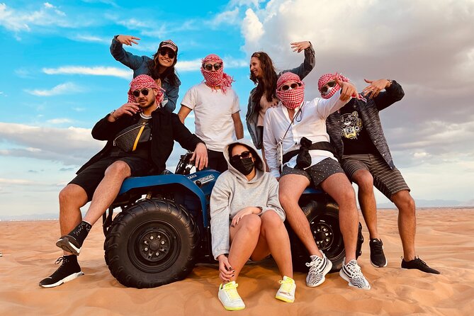 Dubai Red Dunes Quad Bike Tour,Sandboard, Camel ride & BBQ Dinner - Key points to know before booking
