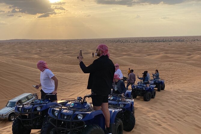 Dubai Red Dunes Quad Bike Tour,Sandboard, Camel ride & BBQ Dinner - BBQ dinner and three kinds of entertainment
