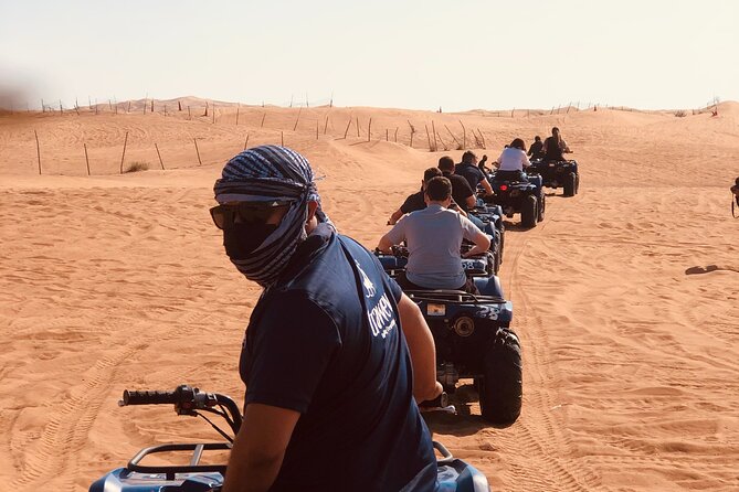 Dubai Red Dunes Quad Bike Tour,Sandboard, Camel ride & BBQ Dinner - A full hour on the quad bike