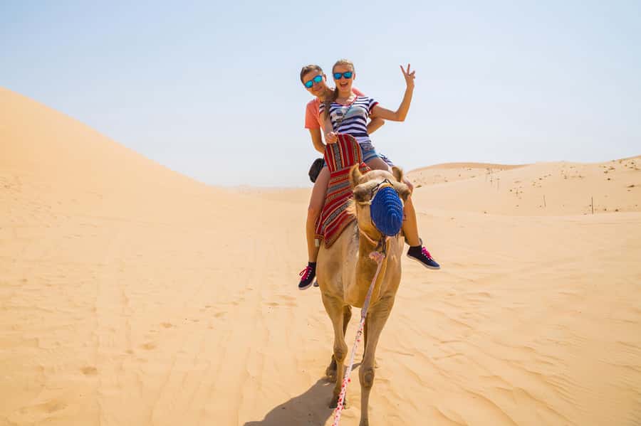 Dubai: Red Dunes Quad Bike with Sandboarding, Camels and BBQ - A one-hour ATV ride across the red dunes