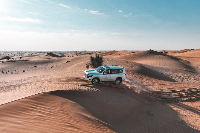 Dubai Red Dunes Safari: Dune Bashing, Camel Ride & Breakfast - Red dunes and the 4WD adventure