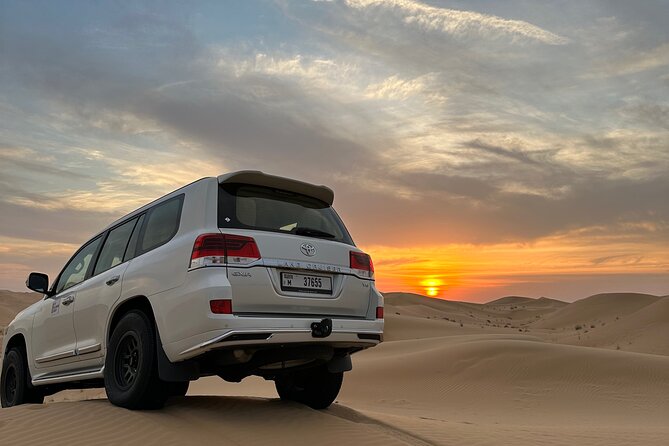 Dubai: Red Dunes, Sandsurf, Camel Ride, BBQ Dinner at Desert Camp - Key things to know before booking