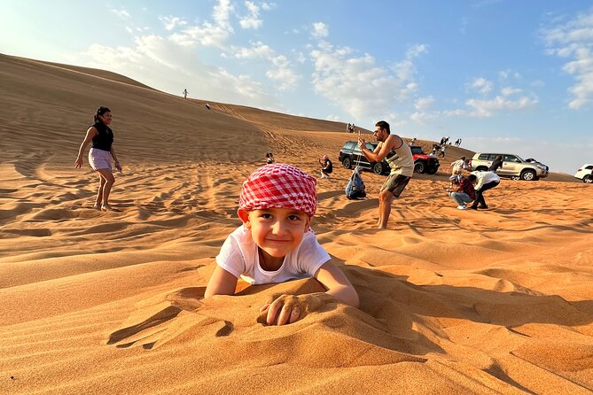 Dubai: Red Dunes, Sandsurf, Camel Ride, BBQ Dinner at Desert Camp - The afternoon pickup from Dubai
