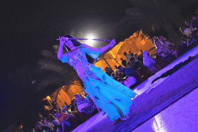 Dubai Red Dunes with Sandboarding, Camel Ride, Falcon & VIP Camp - Sandboarding across the soft slopes