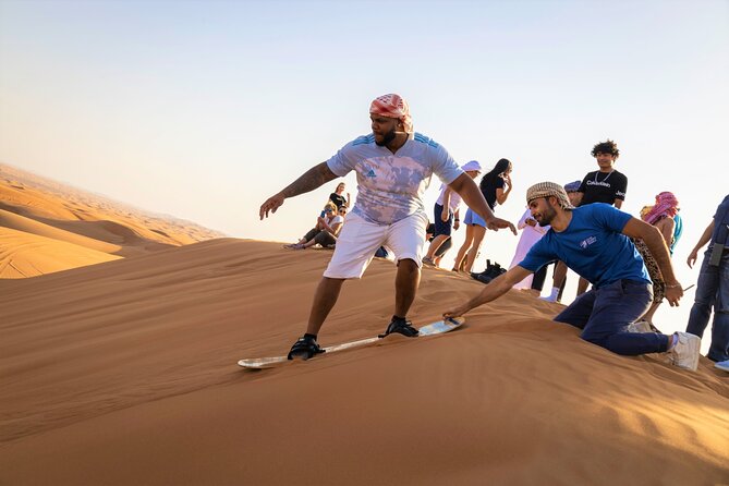 Dubai Red Dunes with Sandboarding, Camel Ride, Falcon & VIP Camp - The first rush: 45 minutes of dune bashing