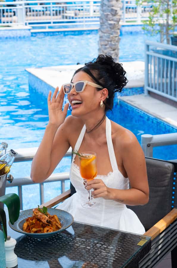 Dubai: Riva Beach Club Pool and Beach Day Pass - Your arrival, lounger, and first look at the Gulf