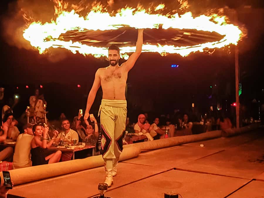 Dubai: Safari, Quad Bike, Camel Ride, and Buffet Dinner - Sandboarding is simple, short, and fun