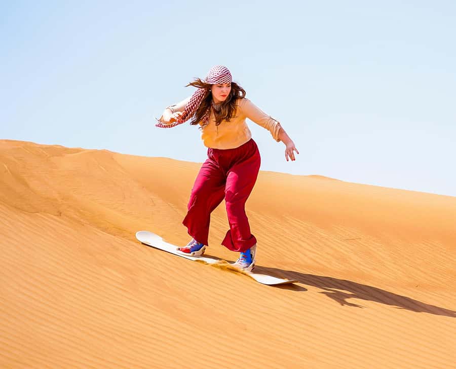 Dubai: Sandboarding, Camel Ride and Red Dune Bashing - Sandboarding down the golden slopes