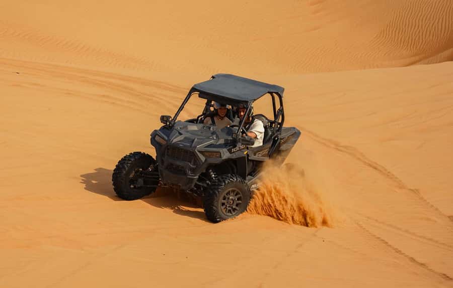 Dubai: Sandboarding, Camel Ride and Red Dune Bashing - Optional quad biking across the sand