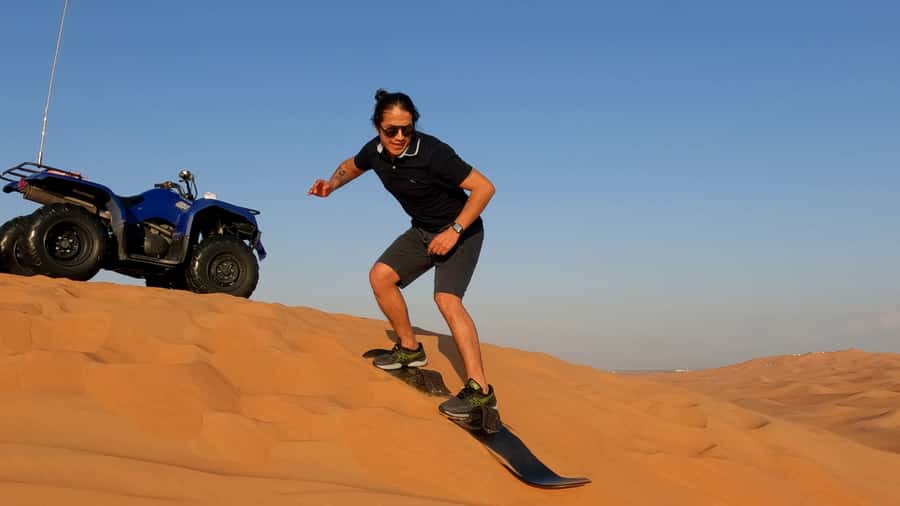 Dubai: Sandboarding, Camel Ride and Red Dune Bashing - Guides, photographs, and the human touch
