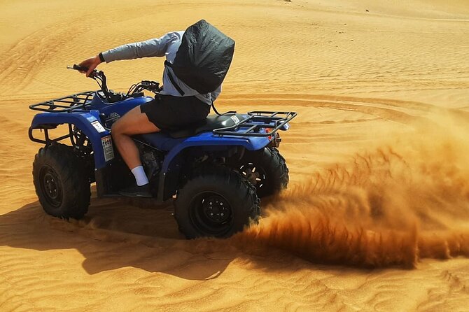Dubai: Sandboarding, Camel Ride and Red Dune Bashing Safari - Thirty minutes behind the handlebars