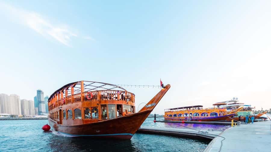 Dubai: Scenic Dhow Cruise with Buffet Dinner and Live Shows - What the Dubai Creek setting adds